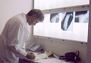 Professor Murrell reviews an x-ray